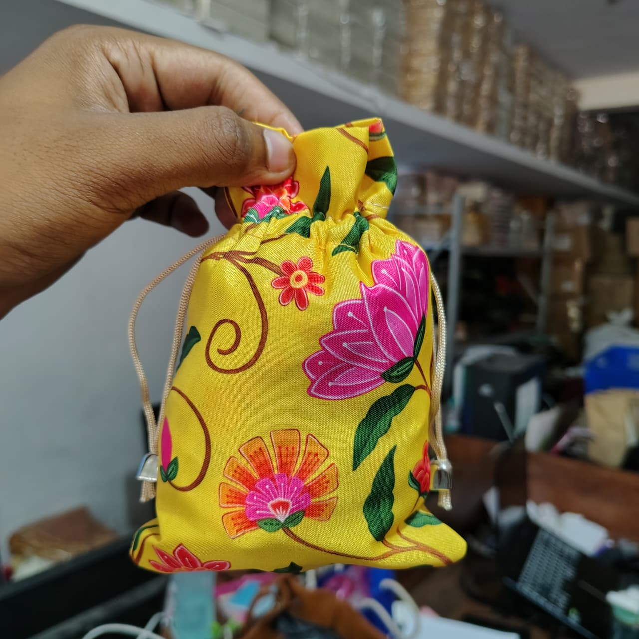 Floral Fabric Potli Bag with Bell | Multiple Designs Drawstring Gift Pouch | Pack of 10 - Image 5